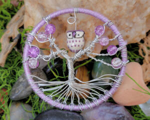 light purple tree of life feasturing a chunky owl charm and light purple glass beads